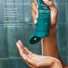 Aveda conditioner with botanical extracts showing plant-powered repair