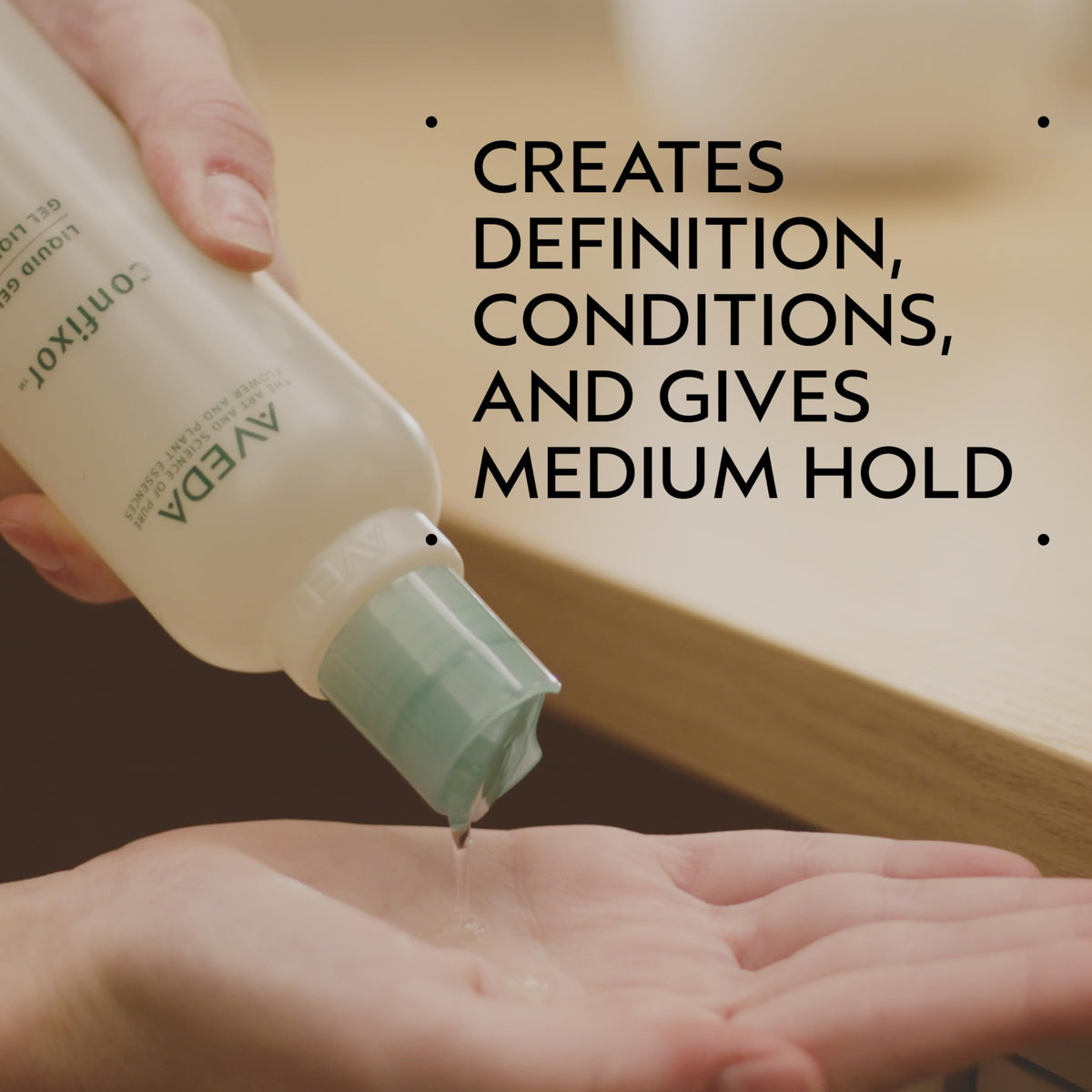 Aveda Confixor pump and label close-up highlighting ingredients and clean-formula benefits