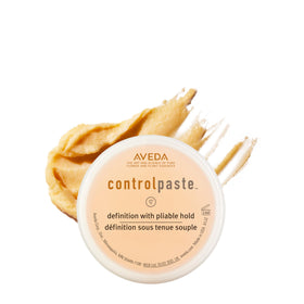 Aveda control paste jar front view showing clean packaging and brand benefit