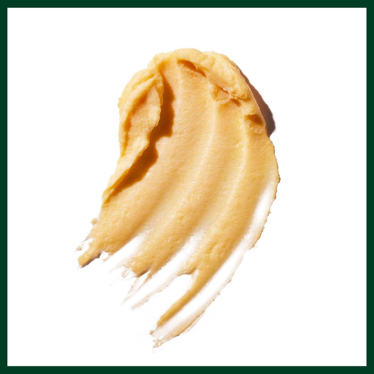 Model wearing messy textured hair styled with Aveda control paste showing matte finish benefit