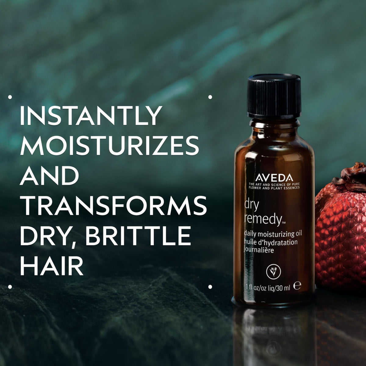 Aveda Dry Remedy bottle close-up focusing on pump and organic buriti oil claim benefit