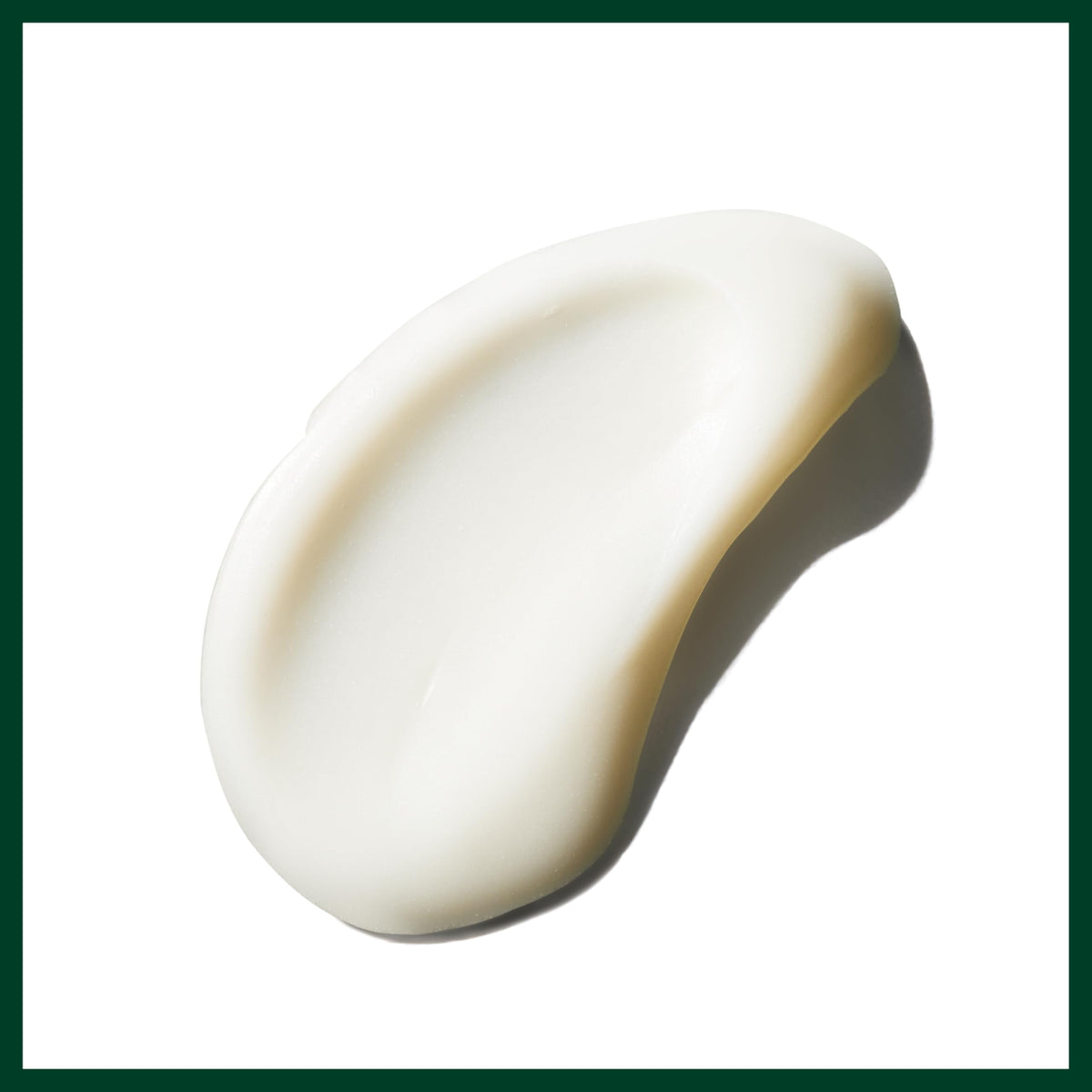 Aveda applying cream to heel demonstrating targeted softening and comfort benefit