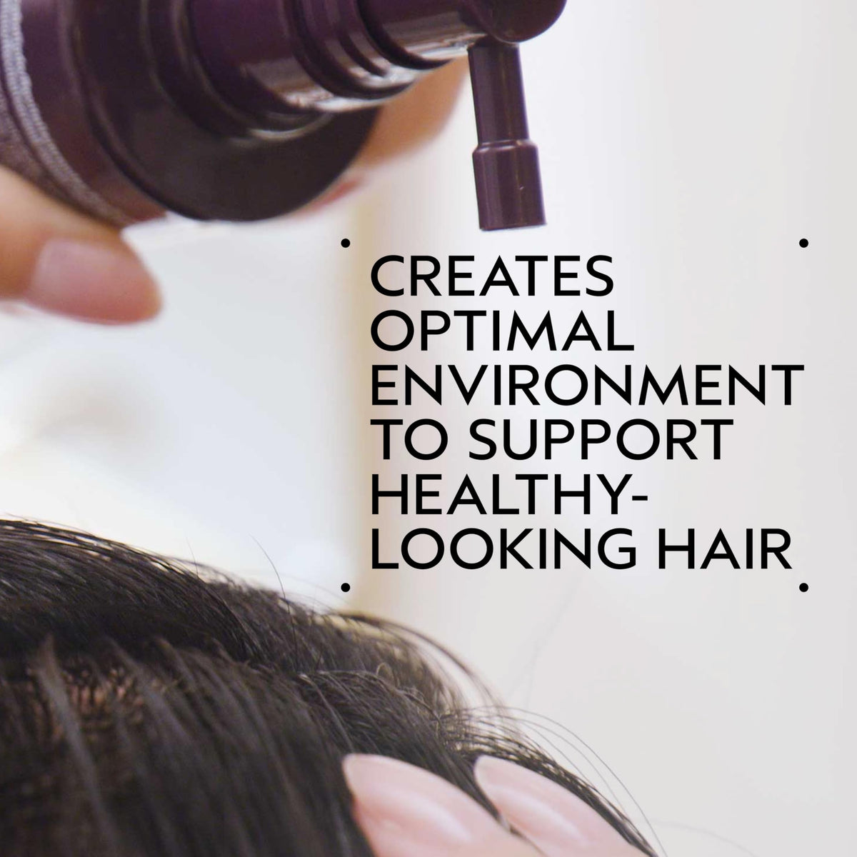 Aveda Invati Ultra applying serum with dropper directly to scalp for targeted treatment