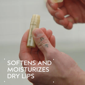 Aveda Lip Saver close-up texture on balm tip highlighting smooth moisturizing finish