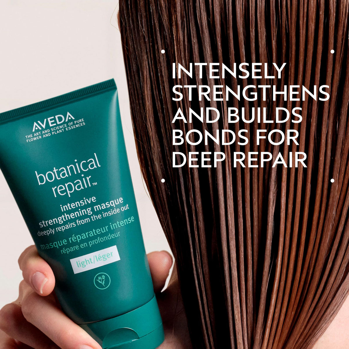 Aveda masque light texture on fingers showing lightweight conditioning benefit