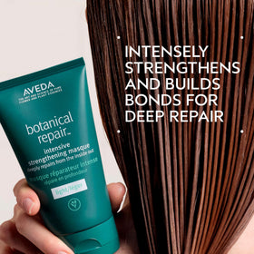 Aveda masque light texture on fingers showing lightweight conditioning benefit