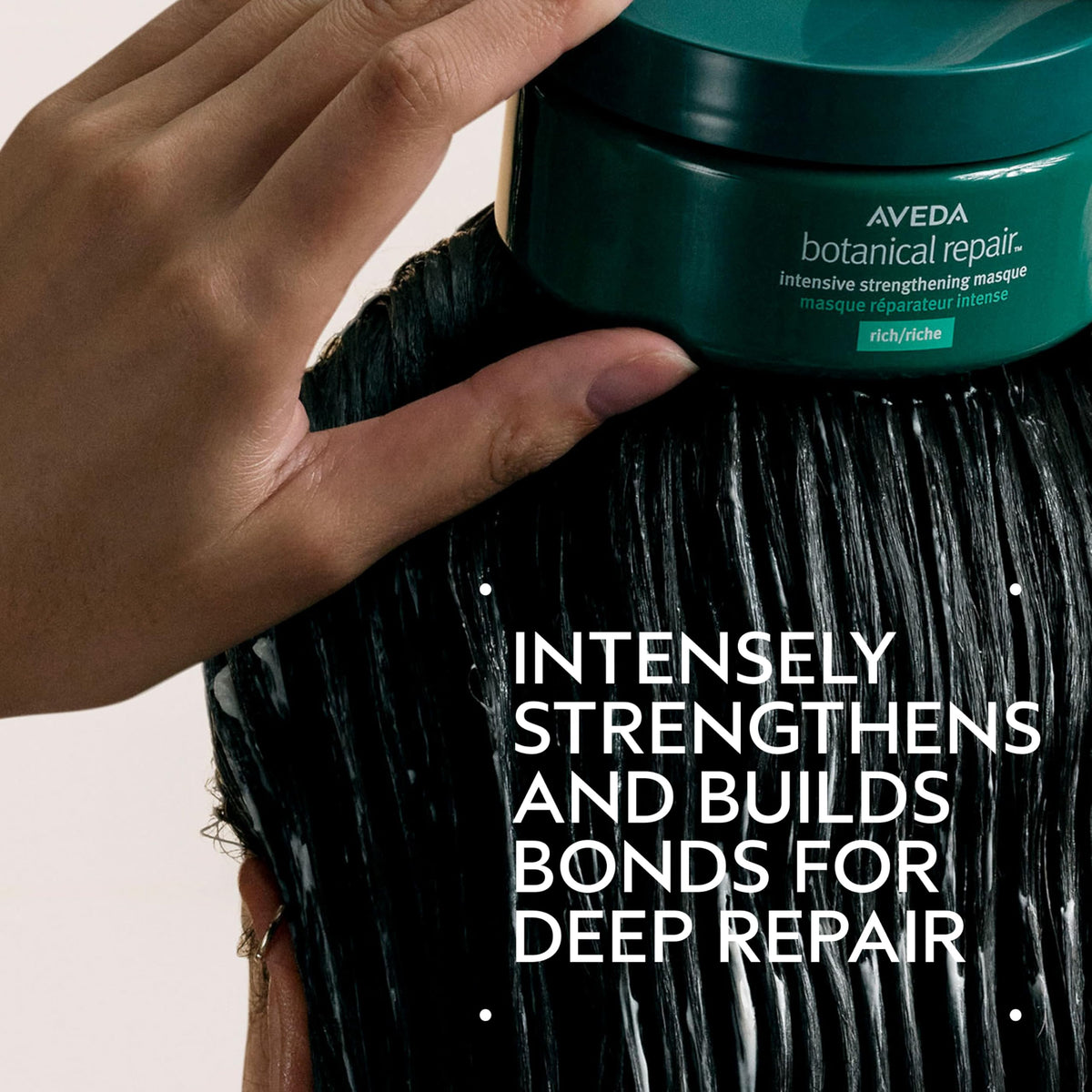 Aveda open jar displaying rich cream texture for deep conditioning