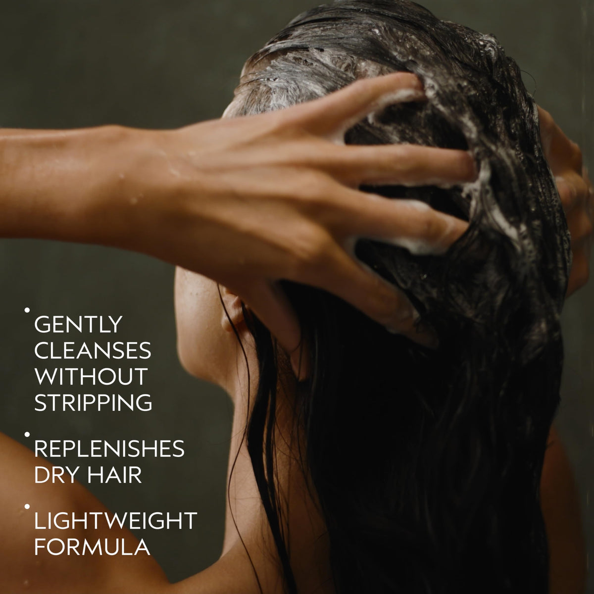 Aveda Nutriplenish creamy shampoo texture on palm for easy application benefit