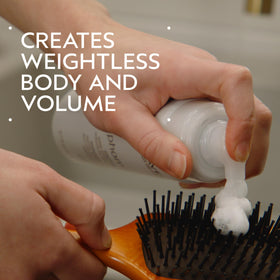 Close-up of Aveda pump detail highlighting non-aerosol air-infused dispenser
