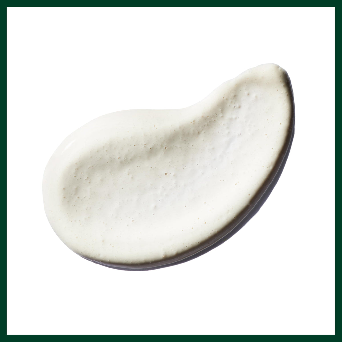 Aveda Radiant Skin Refiner open tube top view showing clay-based cream consistency