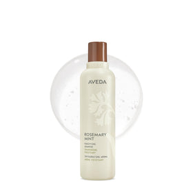 Aveda bottle front view showing label and energizing rosemary scent benefits