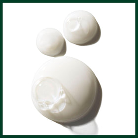 Aveda shampoo styled in bathroom setting suggesting salon-quality home use benefit