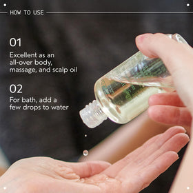Aveda Shampure smoothed on arm demonstrating fast-absorbing hydration