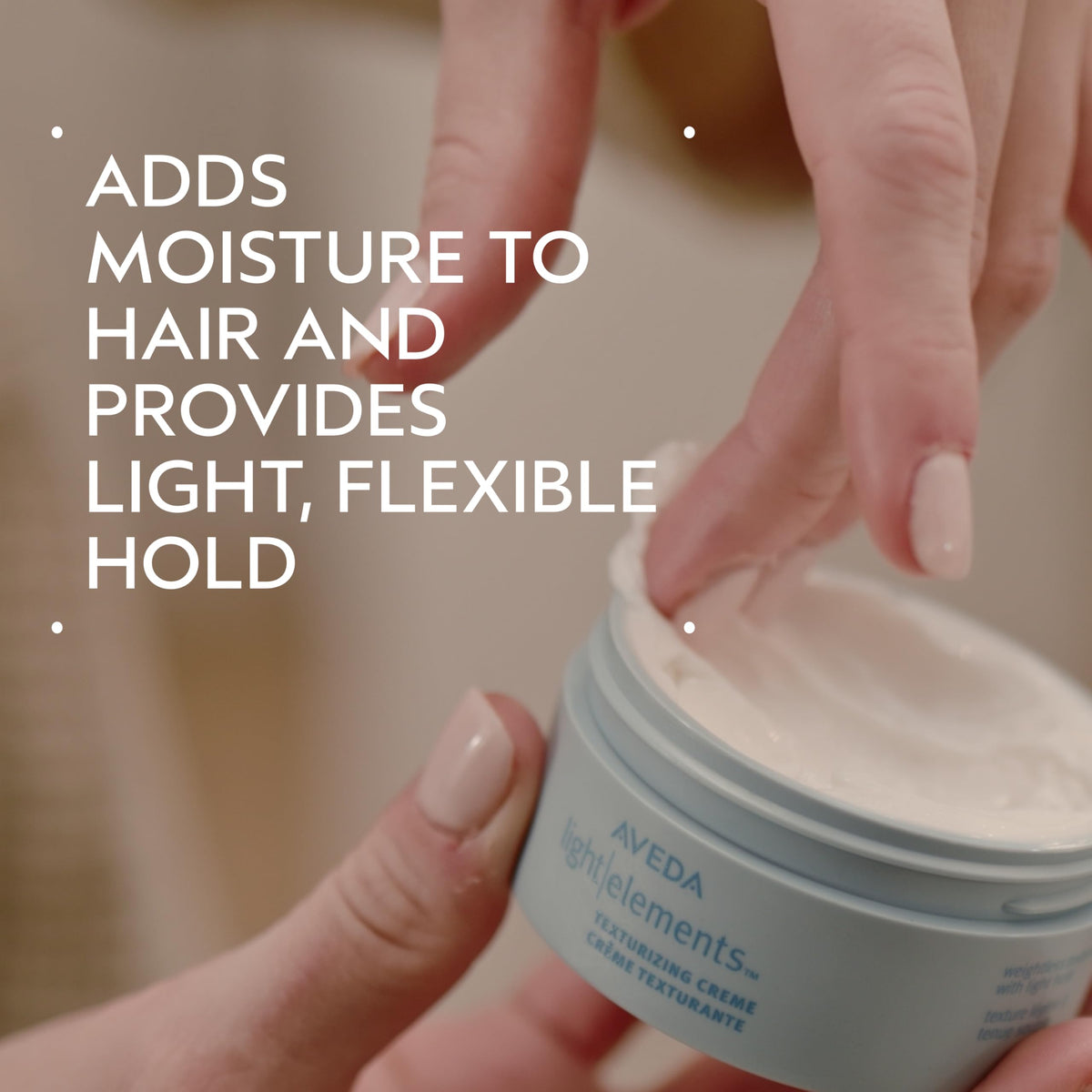 Aveda jar open with crème visible, demonstrating creamy consistency and ease