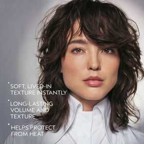 Aveda Tousle Texture spray being applied for instant volume