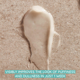 Aveeno being gently dabbed under eye, demonstrates application and reduced puffiness