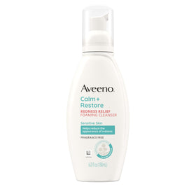 Aveeno bottle on bathroom shelf lifestyle shot promoting routine simplicity