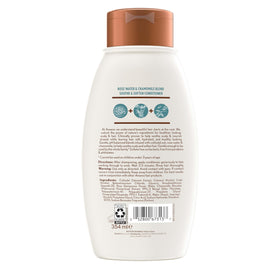 Aveeno-treated color-treated hair appearing soft and vibrant after use