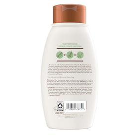 Aveeno after styling showing smoother, stronger-looking hair and shine