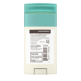 Aveeno kids stick next to ruler showing compact 1.5 oz travel size