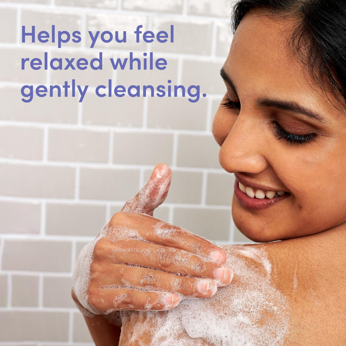 Aveeno lather on shower pouf demonstrating gentle, relaxing cleanse