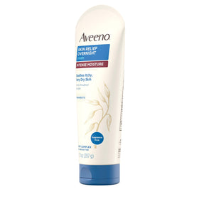 Flatlay of Aveeno tube with oat kernels and shea, benefit: highlights Triple Oat Complex