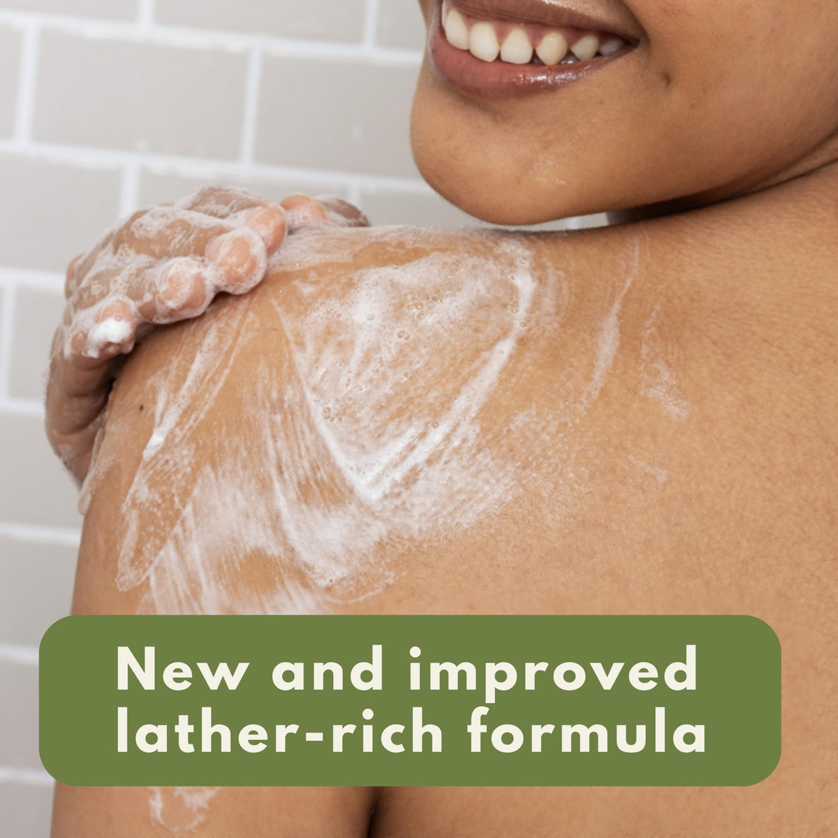 Aveeno bottle pouring creamy lather for gentle cleansing