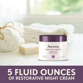 Aveeno jar on nightstand in bathroom setting for nightly routine