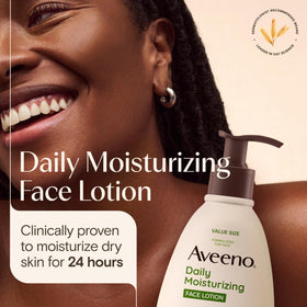 Aveeno lotion texture on fingers showing quick absorption and non-greasy feel