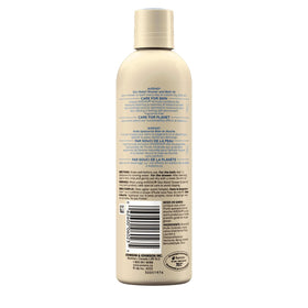 Aveeno oil being applied in-shower demonstrating gentle hydration and improved skin comfort