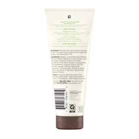 Aveeno 7 oz tube held next to hand showing scale and travel-friendly size convenience