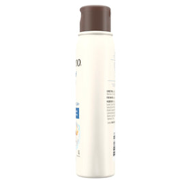 Aveeno bottle beside hand for scale indicating convenient 12 fl oz size benefit