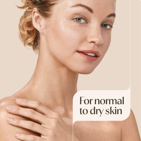 Aveeno 7.5 fl oz tube beside hand for size and travel-friendly benefit
