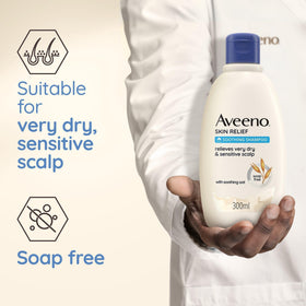 Aveeno ingredient label with oat extract detail emphasizing scalp-balancing benefit
