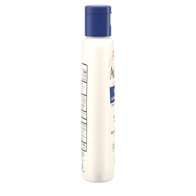 Close-up texture of Aveeno lotion highlighting smooth, non-greasy finish