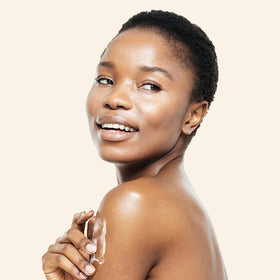 Aveeno lotion texture absorbing into skin for lightweight hydration benefit
