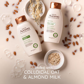 Aveeno 12 fl oz bottle in hand to show true size and scale