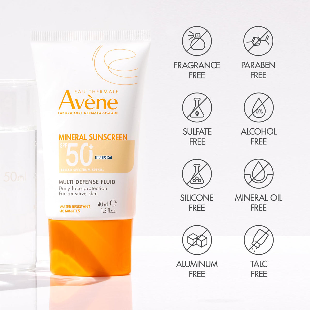 Avène bottle held in hand to show 1.3 fl oz travel-friendly size