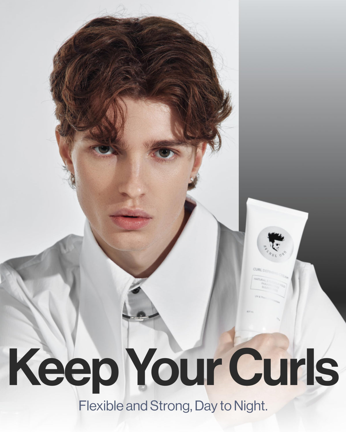 Avenue Man styled model outdoors displaying natural-looking defined curls