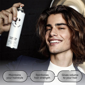 Avenue Man in-use spraying roots to lift hair for instant volume