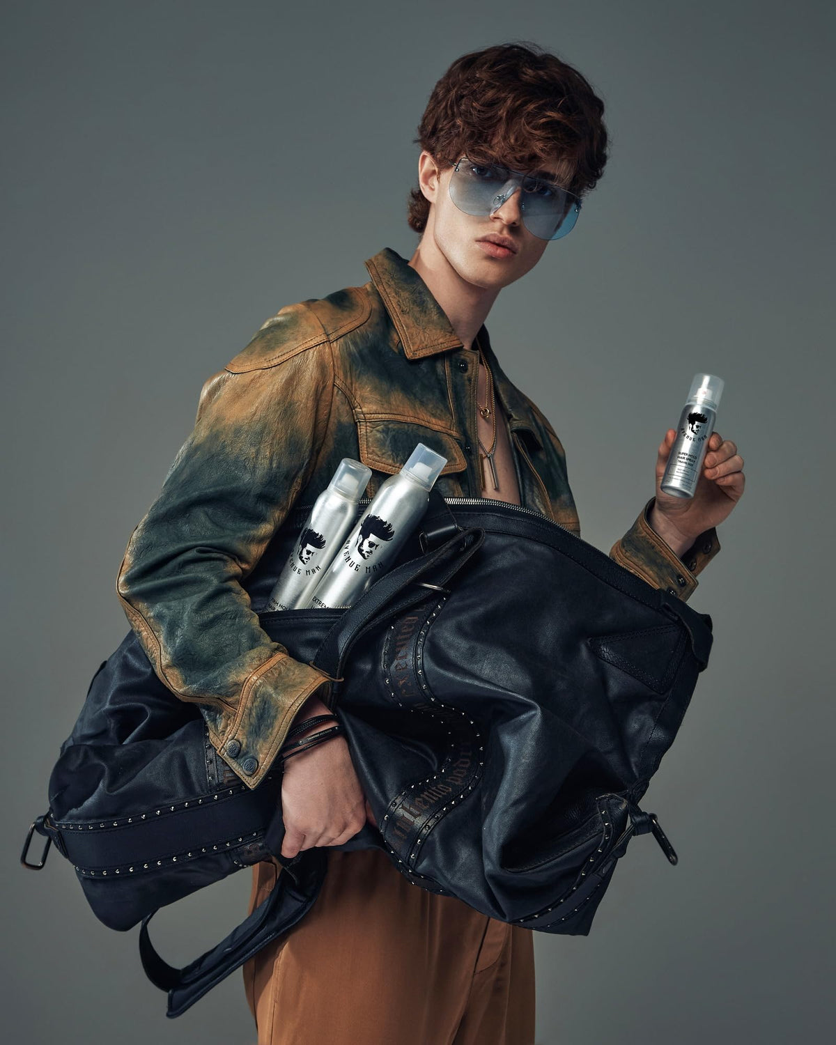 Avenue Man placed in a travel pouch with toiletries showing convenient carry-on readiness
