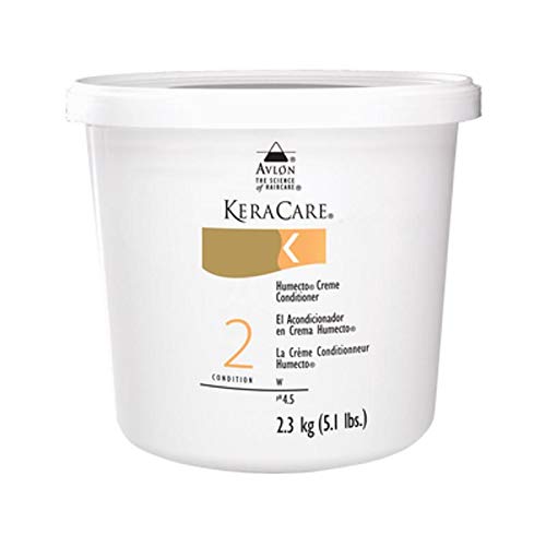 Avlon Keracare applied in salon on damp hair demonstrating improved manageability
