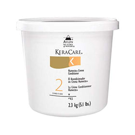 Avlon Keracare applied in salon on damp hair demonstrating improved manageability