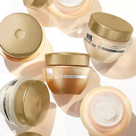 AVON Anew 1.7 oz jar beside coin for scale, showing compact travel-friendly size