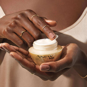 AVON applying cream to jawline for firmer-looking lower face support