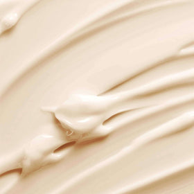 AVON cream close-up texture demonstrating rich, fast-absorbing moisture