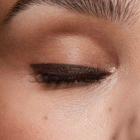 AVON Glimmerstick tip close-up showing creamy texture for precise lines