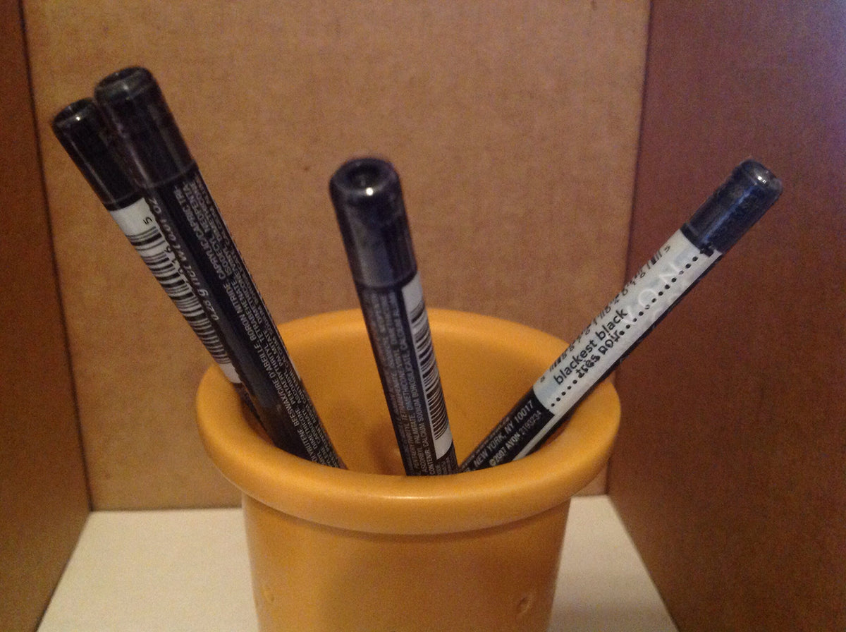 AVON Glimmersticks front packaging showing four black cream liners for bold defined eyes