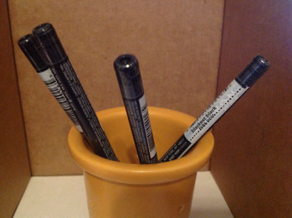 AVON Glimmersticks front packaging showing four black cream liners for bold defined eyes