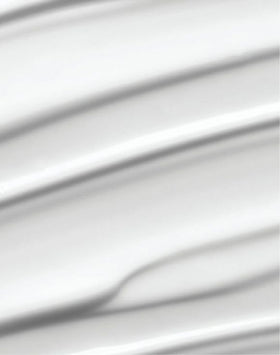 AVON Haiku lotion texture close-up highlighting smooth, fast-absorbing cream